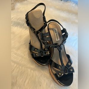 Black wedge heels . Worn twice.